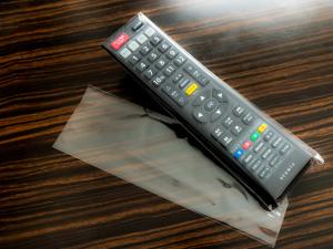 a remote control sitting on top of a table at APA Hotel Nagasaki Dejima in Nagasaki