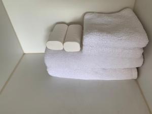 Postel nebo postele na pokoji v ubytování Laguna beach condo resort 3 maldives pattaya pool view ลากูน่า บีช คอนโด รีสอร์ต 3 พัทยา
