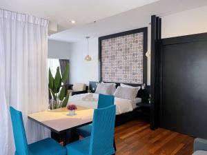 Suite @ Sunway Pyramid Mall客房内的一张或多张床位