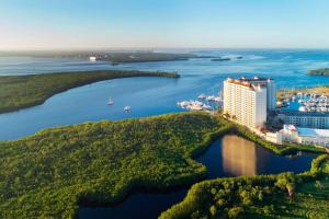 an aerial view of a resort on the water at The Westin Cape Coral Resort at Marina Village in Cape Coral