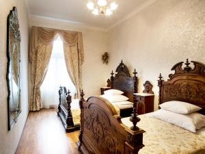 Posteľ alebo postele v izbe v ubytovaní Art Apartments Celakovskeho Sady