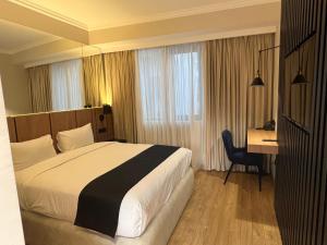 Katil atau katil-katil dalam bilik di Genesis Kosher Hotel Tbilisi