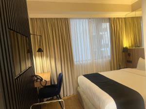 Katil atau katil-katil dalam bilik di Genesis Kosher Hotel Tbilisi