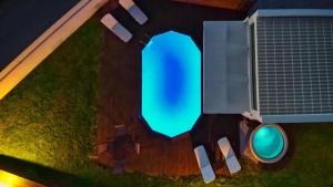 a green traffic light in front of a building at Cocoon Luxury Villas in Maleme