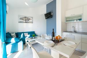 Kuchyň nebo kuchyňský kout v ubytování Apartments Didi