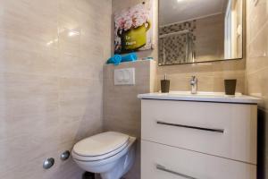 Koupelna v ubytování Apartments Didi