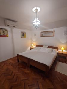 Posteľ alebo postele v izbe v ubytovaní Holiday Home Božo