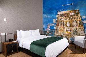 Krevet ili kreveti u jedinici u okviru objekta Theory Hotel