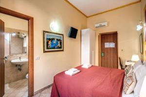 Postel nebo postele na pokoji v ubytování GUEST HOUSE GOITO
