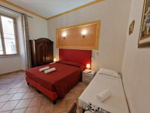 Postel nebo postele na pokoji v ubytování GUEST HOUSE GOITO
