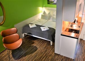 Ein Bett oder Betten in einem Zimmer der Unterkunft Studio-Apartment Augarten