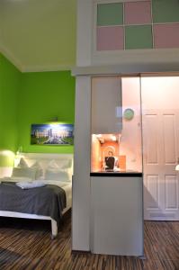 Ein Bett oder Betten in einem Zimmer der Unterkunft Studio-Apartment Augarten