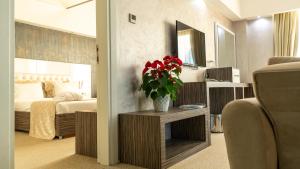 Postel nebo postele na pokoji v ubytování MOX Hotel Wellness & Spa