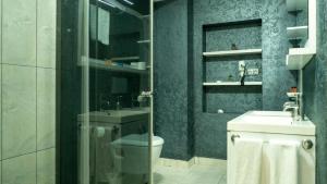 Koupelna v ubytování MOX Hotel Wellness & Spa