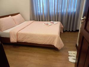 Voodi või voodid majutusasutuse GLC SUITES toas
