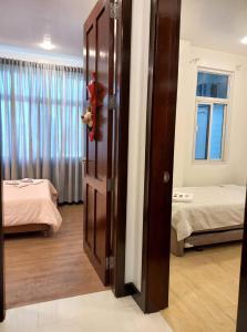Voodi või voodid majutusasutuse GLC SUITES toas