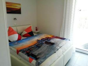 Ein Bett oder Betten in einem Zimmer der Unterkunft Ferienwohnung Inselglück