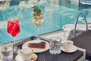 Bazén v ubytování HUBER's Boutiquehotel nebo v jeho okolí