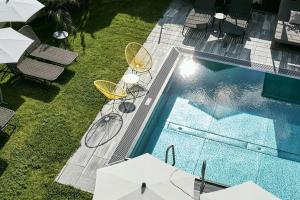 Bazén v ubytování HUBER's Boutiquehotel nebo v jeho okolí + 37 fotografií