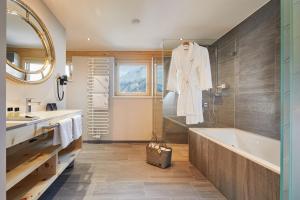 Koupelna v ubytování HUBER's Boutiquehotel