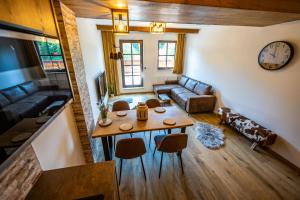 Posezení v ubytování Wellness & Spa Pila Kvilda AP 2 01 a AP 3 07