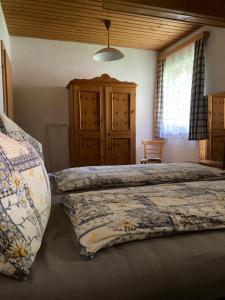 Postel nebo postele na pokoji v ubytování Ellmauhof