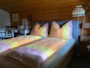Postel nebo postele na pokoji v ubytování Ellmauhof