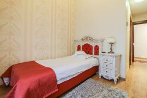 Postel nebo postele na pokoji v ubytování Astoria Grand Hotel