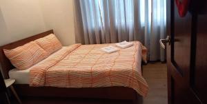 Voodi või voodid majutusasutuse GLC SUITES toas