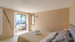 Postel nebo postele na pokoji v ubytování Countryhouse La Niña Chole Cártama by Ruralidays + 24 fotografií