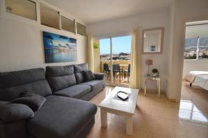 A seating area at BENAL BEACH, Superb 2 Bedroom 2 Bathroom Beach front Apartment sleeps 6