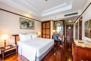 Ein Bett oder Betten in einem Zimmer der Unterkunft Vinpearl Resort Nha Trang