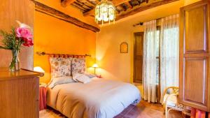 Postel nebo postele na pokoji v ubytování Casa Africa La Taha - Mecina Fondales by Ruralidays