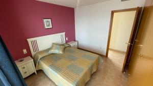 Łóżko lub łóżka w pokoju w obiekcie Atico Morro de Gos REF 058