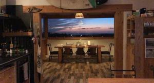 Televízia a/alebo spoločenská miestnosť v ubytovaní Tindaya Nature Home Ocean View