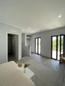 Ένα ή περισσότερα κρεβάτια σε δωμάτιο στο Apartment T2 Olhão +15 φωτογραφίες