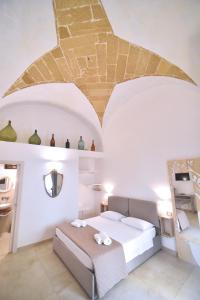 a bedroom with a bed with a star ceiling at L'Antica Rimessa Da Gigi in Gallipoli +77 photos