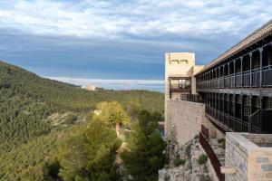 a building with a view of a mountain at Parador de Ja&eacute;n in Ja&eacute;n
