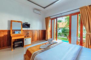 Katil atau katil-katil dalam bilik di Green Valley Bungalow +27 gambar