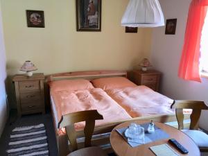 Postel nebo postele na pokoji v ubytování Penzion Trattoria