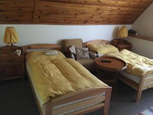 Postel nebo postele na pokoji v ubytování Penzion Trattoria