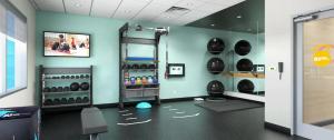 een kamer met een fitnessruimte met veel helmen bij Tru By Hilton Wilmington in Wilmington