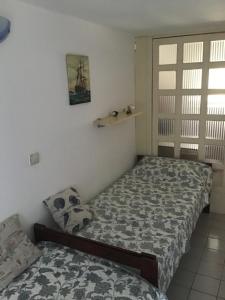 Postel nebo postele na pokoji v ubytování Apartments Subotic