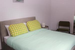 Casa Graziella- appartamenti vacanze tesisinde bir odada yatak veya yataklar