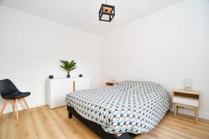 Posteľ alebo postele v izbe v ubytovaní T2 Cosy en centre-ville proche du lac avec balcon