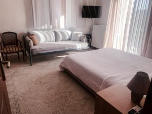 Posteľ alebo postele v izbe v ubytovaní API Projects Nafplio - Family Superior Apartment