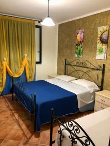 Posteľ alebo postele v izbe v ubytovaní Villa Oasi Dei Sogni