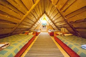 A bed or beds in a room at Värava Farm