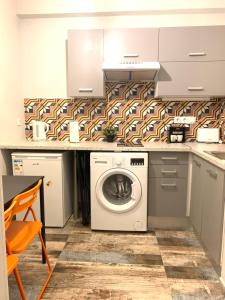 A kitchen or kitchenette at Athens City Themis 6