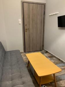 A television and/or entertainment centre at Athens City Themis 6